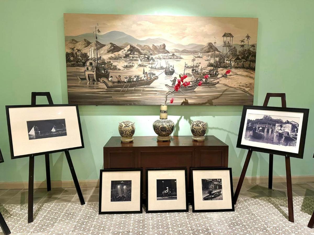 Allegro Hoi An . A Little Luxury Hotel & Spa Exterior photo A display of photographs by the author